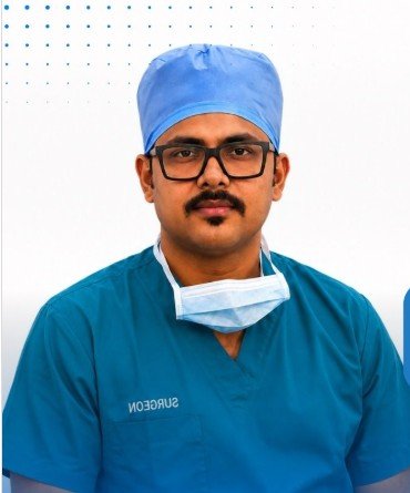 Portrait of Dr. Ankur G. Das in surgical attire
