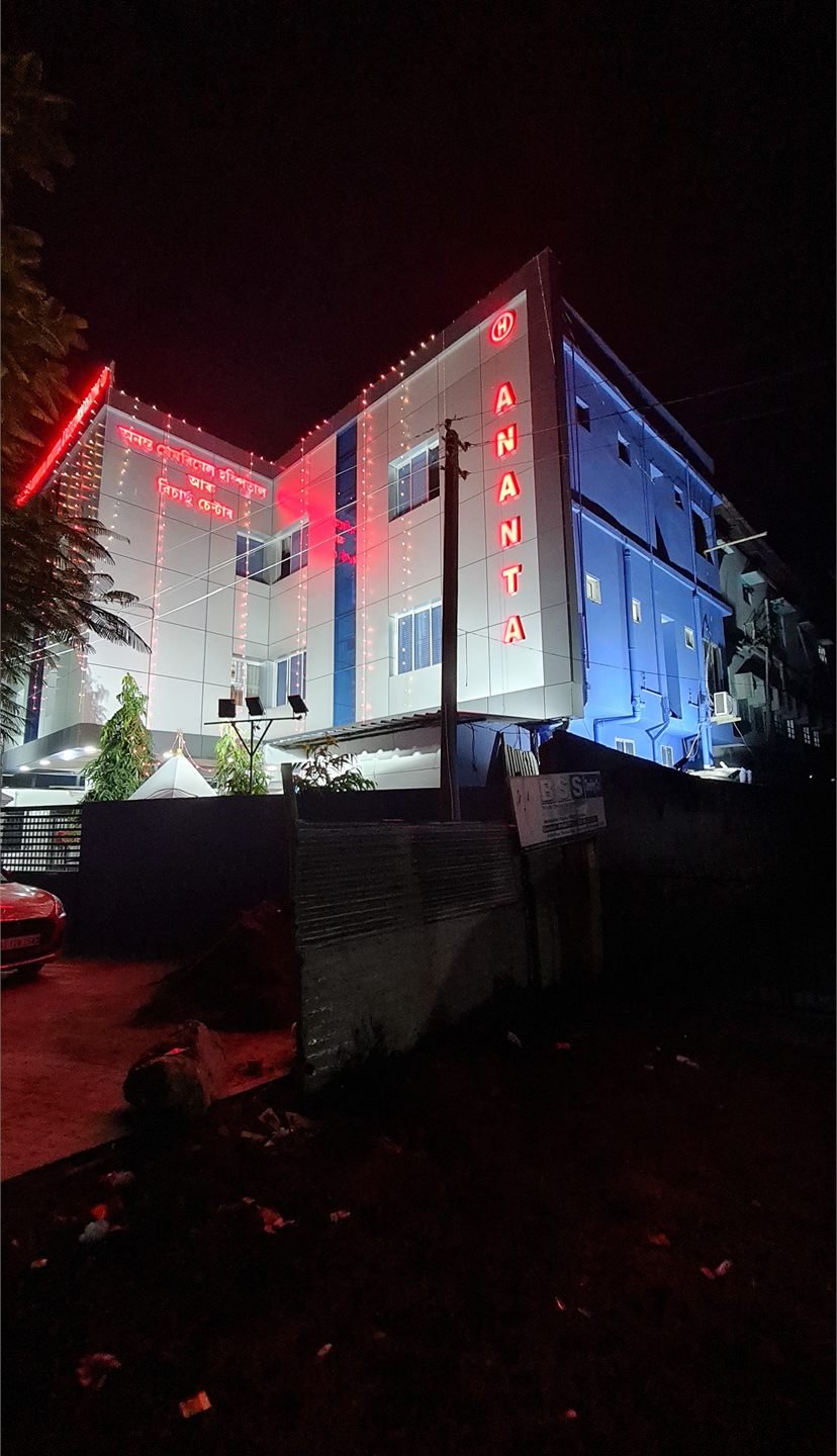 The hospital building lit up in the evening
